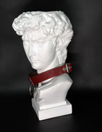 LION’S HEAD CHOKER: Red wine