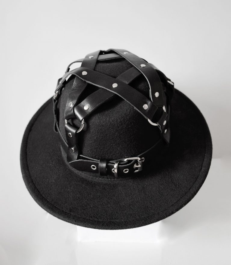 leather harness with fedora hat