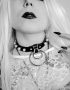 gothic lady with white hair and leather choker