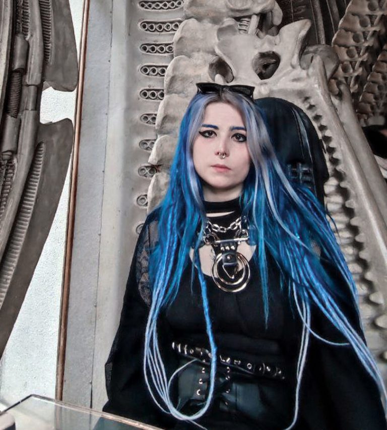 pastel goth girl in Giger museum