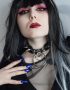 gothic girl in spiked choker with ring