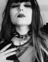 goth lady wearing choker with spikes made of leather