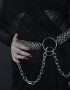 gothic girl in black dress and chainmail belt