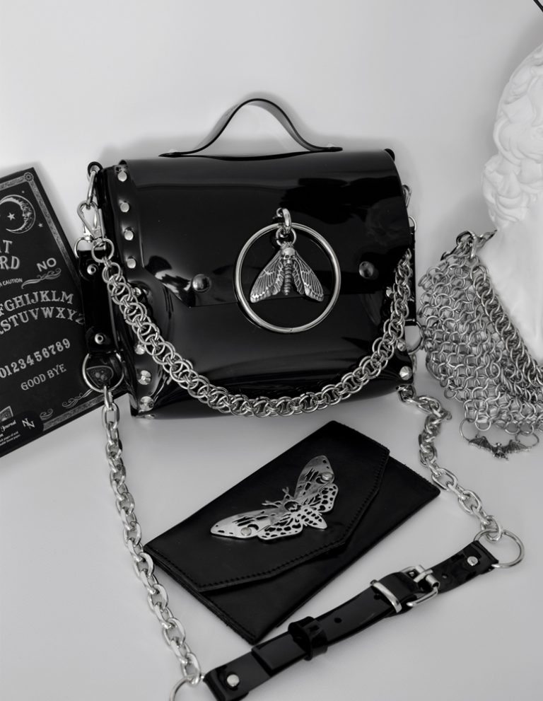 pvc vinyl handbag with moth pendant symbol