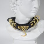leather neck collar with gold moon pendant