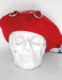 red woolen French beret with leather straps and huge pin