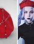 red woolen beret with harness and metal pin