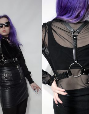 pretty goth girl wearing leather body harness